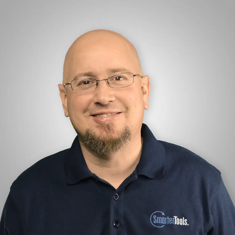 Headshot of Derek Curtis, SmarterTools team member wearing branded polo