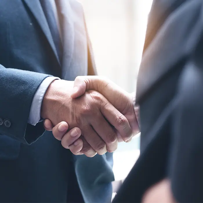 Business handshake symbolizing SmarterTools partnership and collaboration